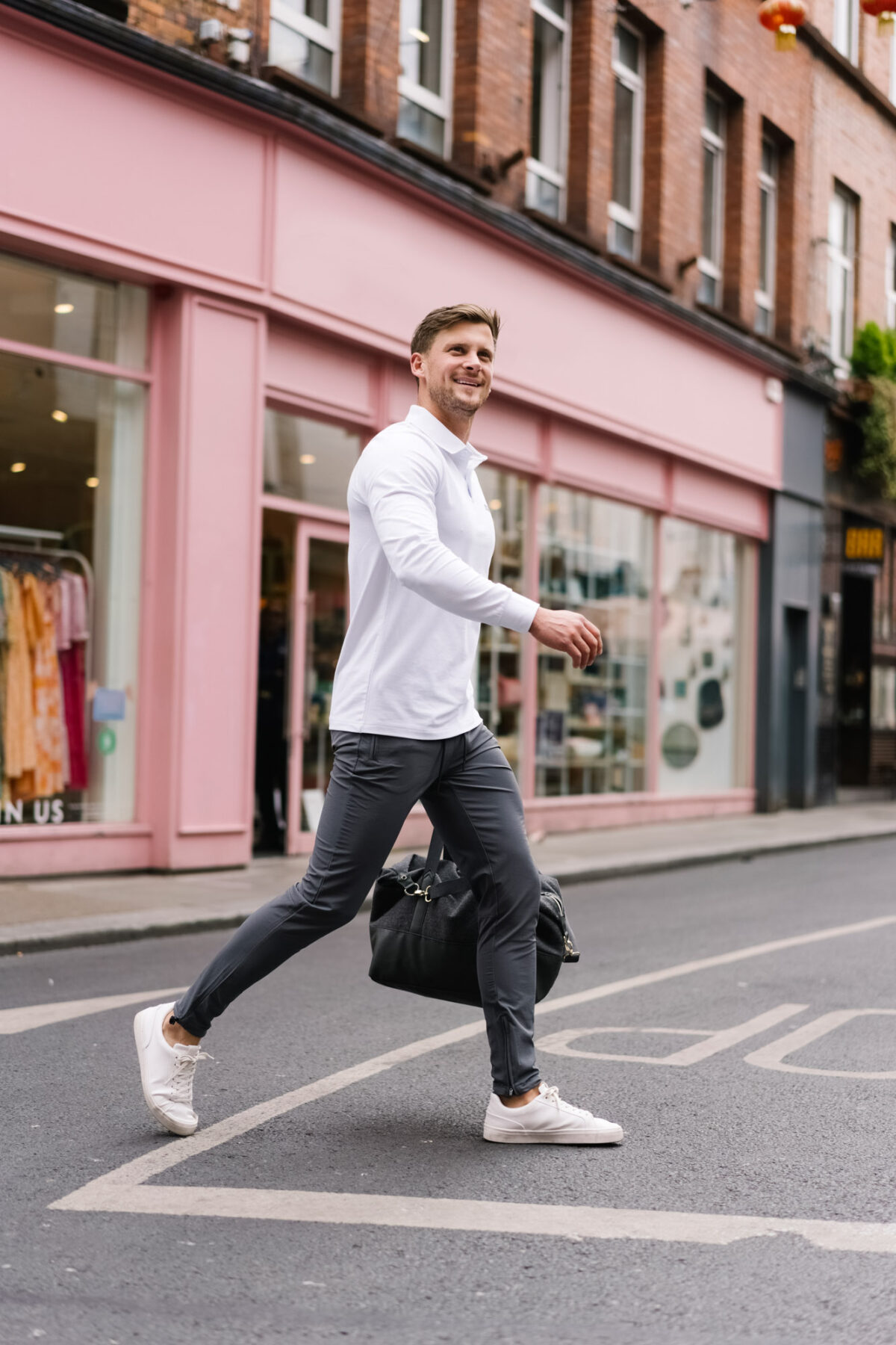 Man wearing the Explore Jogger in charcoal.