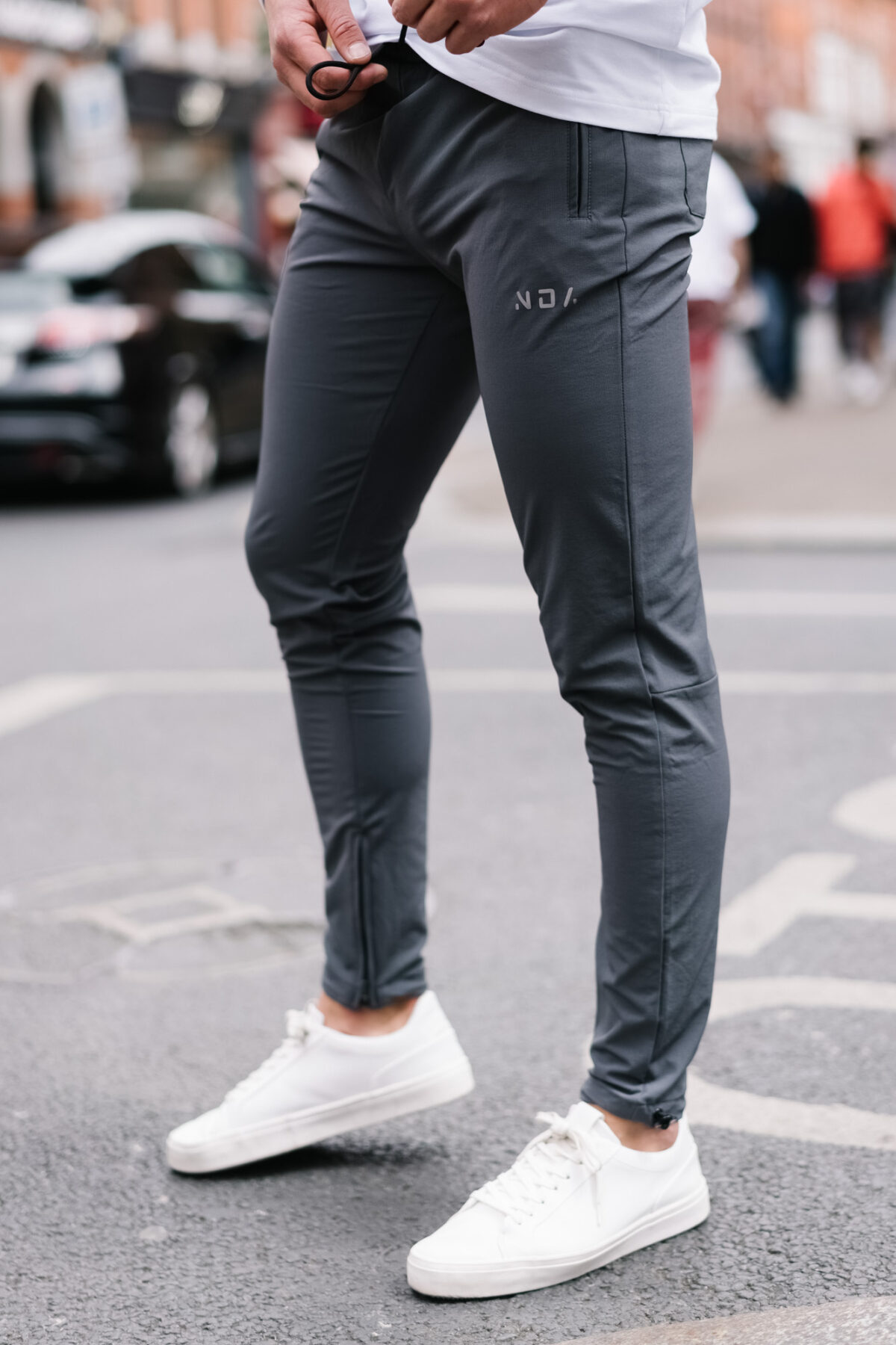 Man wearing the Explore Jogger in charcoal.