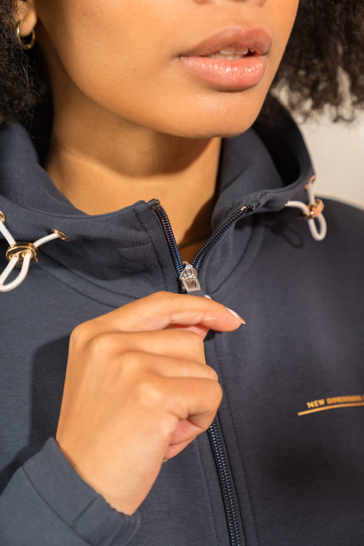 Ultra warm, our Virtue Zip Hoodie (Navy) brings you endless comfort, all while looking great. Full zip with a split dipped hem. Super soft cotton, aligns with the sleek shape to make you feel comfortable on the move.