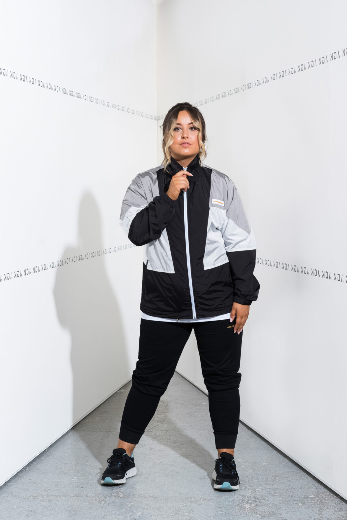 This jacket is a stylish unisex relaxed retro style jacket. The perfect layer to take you from the gym to the streets. Specifically designed with a woven fabric that keeps breezy gusts at bay. Ready for a walk in the city after a morning workout? You’ll look fresh and authentic every step of the way.