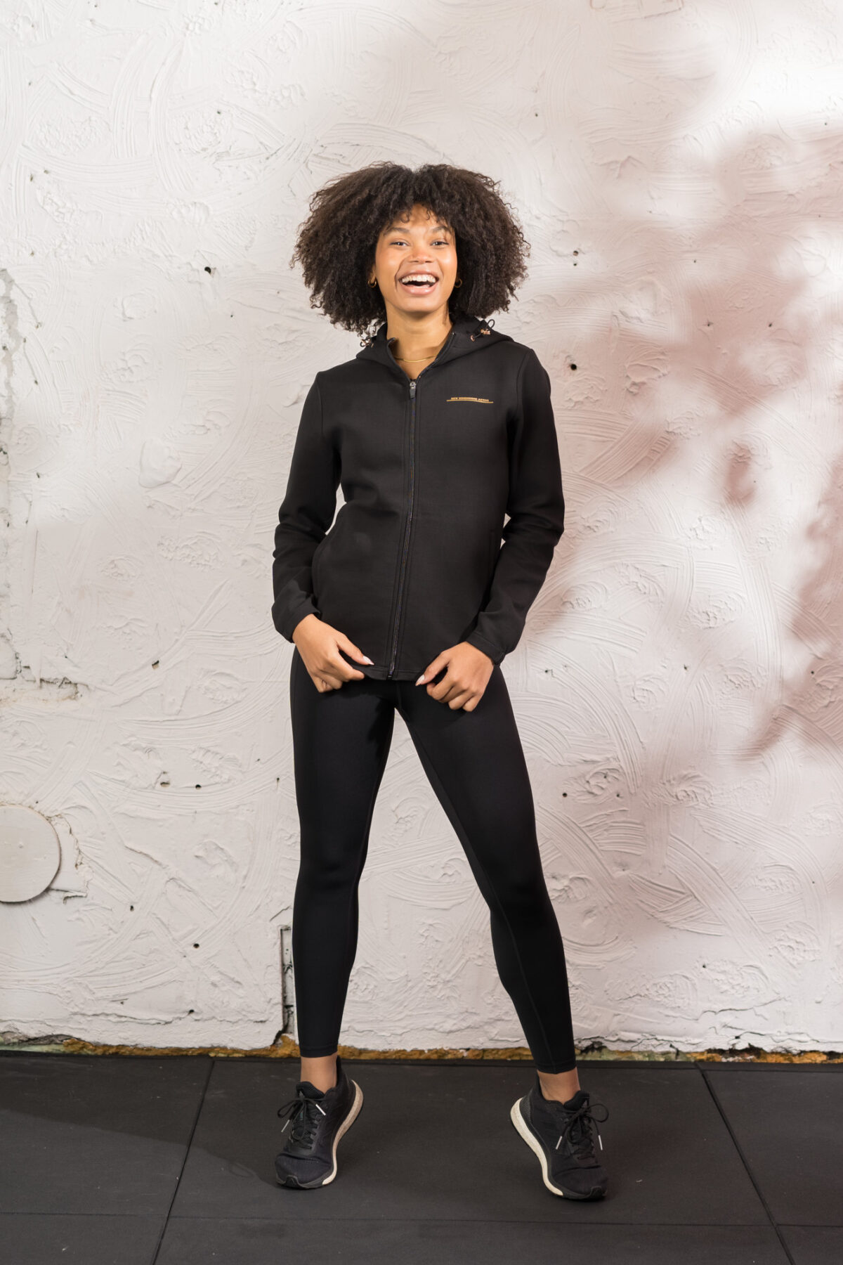 Ultra warm, our Virtue Zip Hoodie (Black) brings you endless comfort, all while looking great. Full zip with a split dipped hem. Super soft cotton, aligns with the sleek shape to make you feel comfortable on the move.