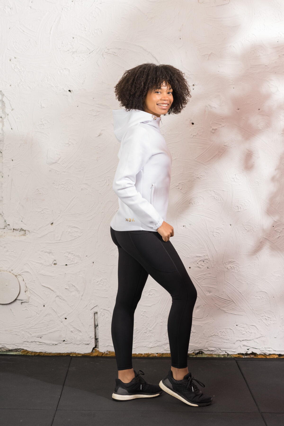 Ultra warm, our Virtue Zip Hoodie (White) brings you endless comfort, all while looking great. Full zip with a split dipped hem. Super soft cotton, aligns with the sleek shape to make you feel comfortable on the move.