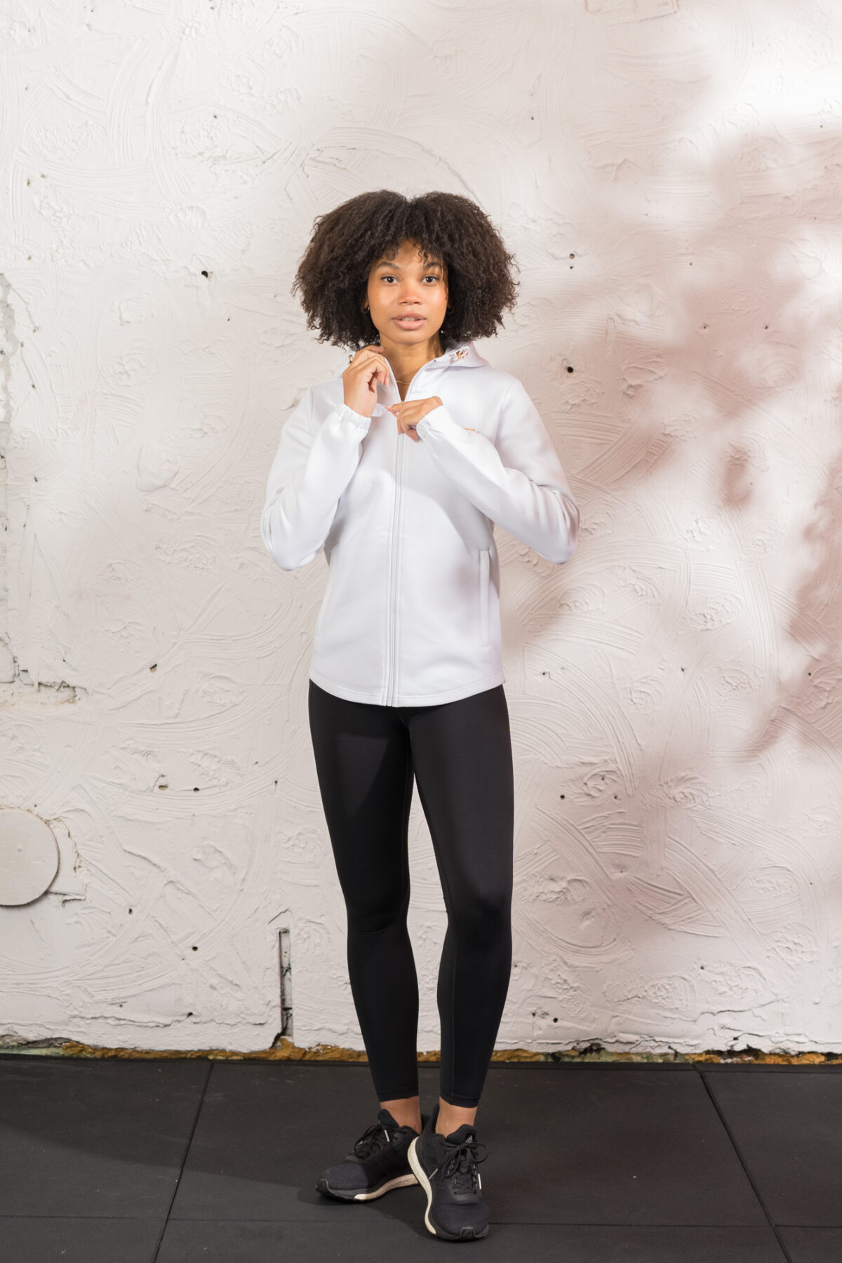 Ultra warm, our Virtue Zip Hoodie (White) brings you endless comfort, all while looking great. Full zip with a split dipped hem. Super soft cotton, aligns with the sleek shape to make you feel comfortable on the move.