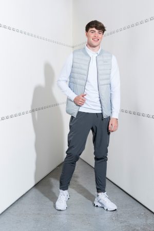 Designed to give you that modern-minimalistic aesthetic, high neckline with slim padded panels and an elastic hem.