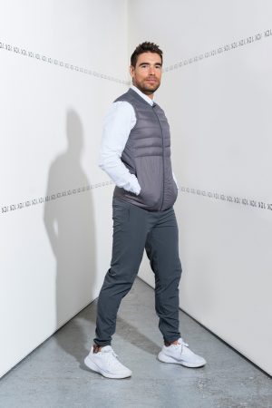 Designed to give you that modern-minimalistic aesthetic, high neckline with slim padded panels and an elastic hem.