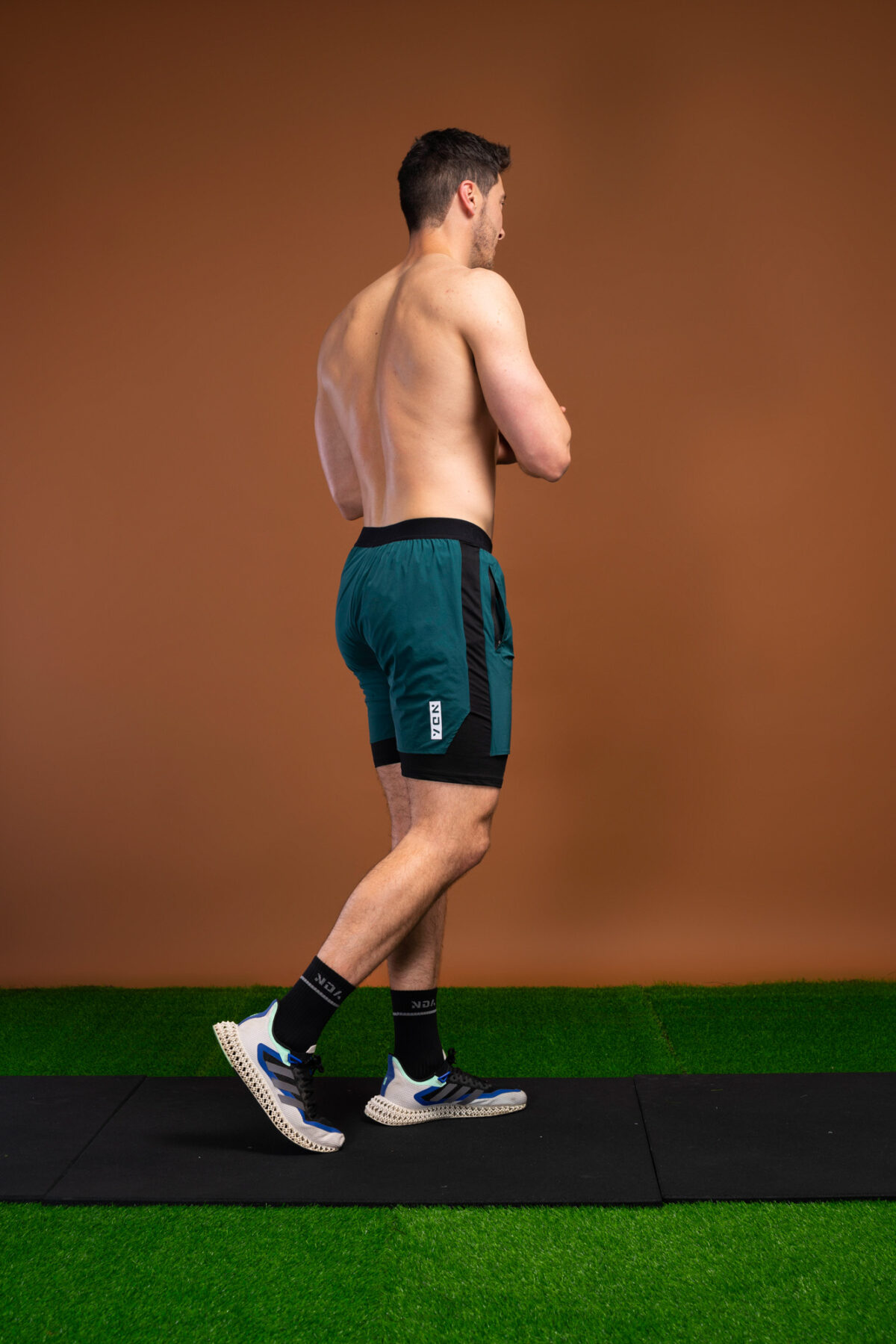 Introducing the revolutionary Benchmark Performance Shorts (Dark Teal)! Our new innovation is disguised as a 2 in 1, but is in fact an outer layer attached to the under layer to optimise movement and provide the best performance possible. These shorts are made from a lightweight and breathable fabric that is designed to provide a comfortable fit and move with you. The fabric is also water-resistant, so you can stay dry and comfortable no matter the activity. The four-way stretch fabric ensures that you have the full range of movement needed to perform your best.