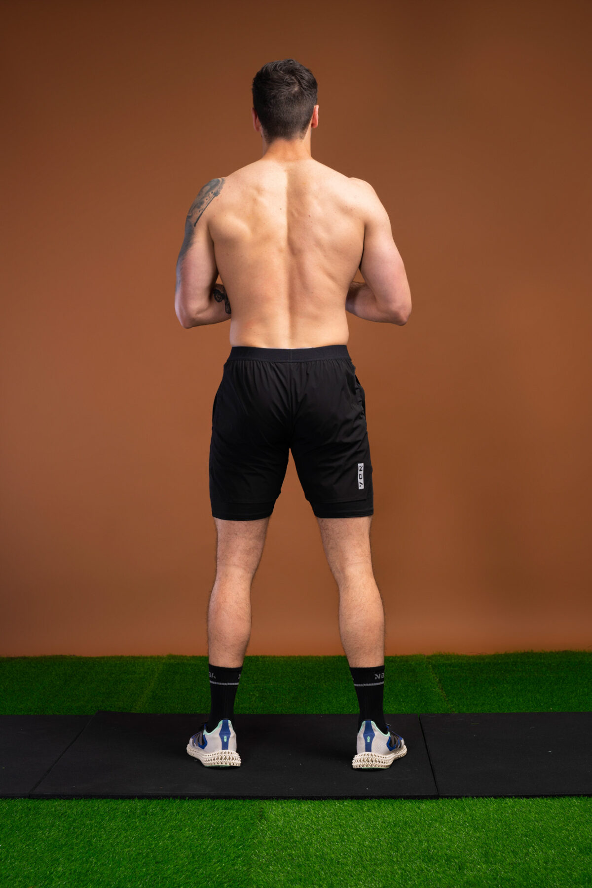 Introducing the revolutionary Benchmark Performance Shorts (Black)! Our new innovation is disguised as a 2 in 1, but is in fact an outer layer attached to the under layer to optimise movement and provide the best performance possible. These shorts are made from a lightweight and breathable fabric that is designed to provide a comfortable fit and move with you. The fabric is also water-resistant, so you can stay dry and comfortable no matter the activity. The four-way stretch fabric ensures that you have the full range of movement needed to perform your best.