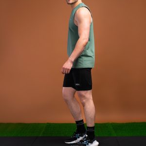 The Benchmark Tank Top (Olive) is designed to keep you cool and comfortable in any situation. The cotton blend material is soft and breathable, allowing air to circulate freely and keeping you cool. The stretch in the material ensures you can move without feeling restricted. The sleeveless design and high neckline give you a stylish look, while the lightweight material won’t weigh you down.