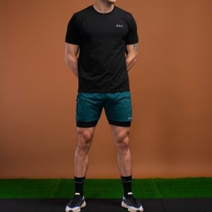 The Benchmark Tank Top (Black) is designed to keep up with your active lifestyle. It’s the perfect choice for any workout, from running to lifting to lounging. The lightweight cotton blend material keeps you cool and comfortable, while the 8 way stretch material allows for unrestricted movement. The short sleeve design and high neckline provide additional coverage, and the reflective logos add a touch of style.