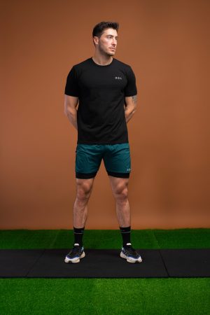 The Benchmark Tank Top (Black) is designed to keep up with your active lifestyle. It’s the perfect choice for any workout, from running to lifting to lounging. The lightweight cotton blend material keeps you cool and comfortable, while the 8 way stretch material allows for unrestricted movement. The short sleeve design and high neckline provide additional coverage, and the reflective logos add a touch of style.
