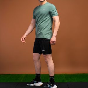 The Benchmark Tank Top (Olive) is designed to keep up with your active lifestyle. It’s the perfect choice for any workout, from running to lifting to lounging. The lightweight cotton blend material keeps you cool and comfortable, while the 8 way stretch material allows for unrestricted movement. The short sleeve design and high neckline provide additional coverage, and the reflective logos add a touch of style.
