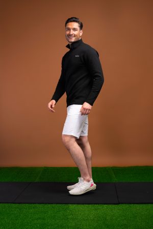For those looking for a stylish and performance-driven 1/4 zip, the Tempo Golf 1/4 Zip (Black) is the perfect choice. With its premium material, flatline design, and slimming fit, you can look and feel your best while playing golf. Whether you’re a beginner or a professional, the Golf 1/4 Zip is the perfect choice for any golfer.