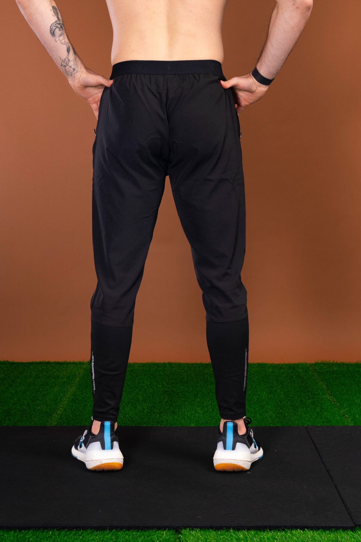 The Benchmark Jogger (Black) is made from a lightweight, breathable fabric that helps keep you cool and comfortable during any activity. The fabric also helps to wick away moisture, which is great for those hot summer days. The joggers also feature a slim fit that hugs your body in all the right places. The elasticated waistband also provides a secure fit and helps keep the joggers in place.