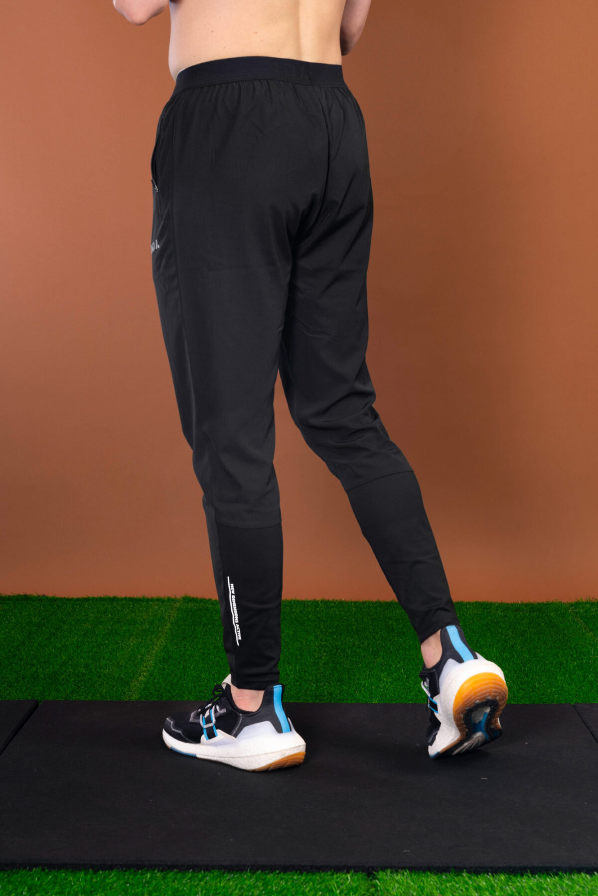 The Benchmark Jogger (Black) is made from a lightweight, breathable fabric that helps keep you cool and comfortable during any activity. The fabric also helps to wick away moisture, which is great for those hot summer days. The joggers also feature a slim fit that hugs your body in all the right places. The elasticated waistband also provides a secure fit and helps keep the joggers in place.