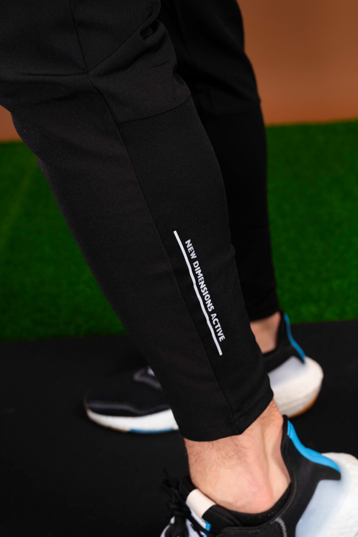 The Benchmark Jogger (Black) is made from a lightweight, breathable fabric that helps keep you cool and comfortable during any activity. The fabric also helps to wick away moisture, which is great for those hot summer days. The joggers also feature a slim fit that hugs your body in all the right places. The elasticated waistband also provides a secure fit and helps keep the joggers in place.