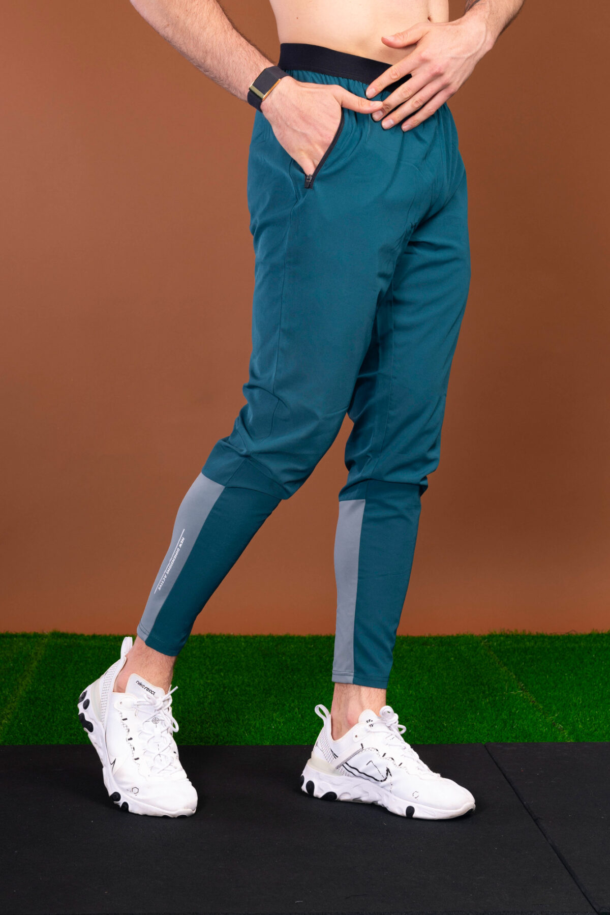 The Benchmark Jogger (Teal) is made from a lightweight, breathable fabric that helps keep you cool and comfortable during any activity. The fabric also helps to wick away moisture, which is great for those hot summer days. The joggers also feature a slim fit that hugs your body in all the right places. The elasticated waistband also provides a secure fit and helps keep the joggers in place.