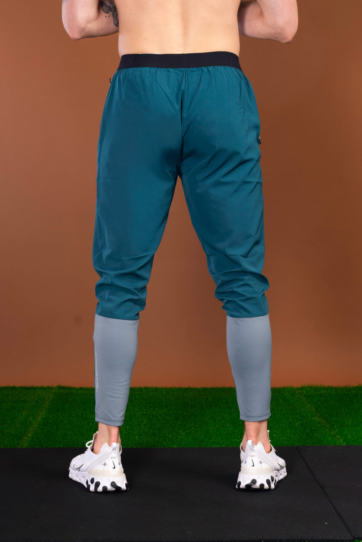 The Benchmark Jogger (Teal) is made from a lightweight, breathable fabric that helps keep you cool and comfortable during any activity. The fabric also helps to wick away moisture, which is great for those hot summer days. The joggers also feature a slim fit that hugs your body in all the right places. The elasticated waistband also provides a secure fit and helps keep the joggers in place.