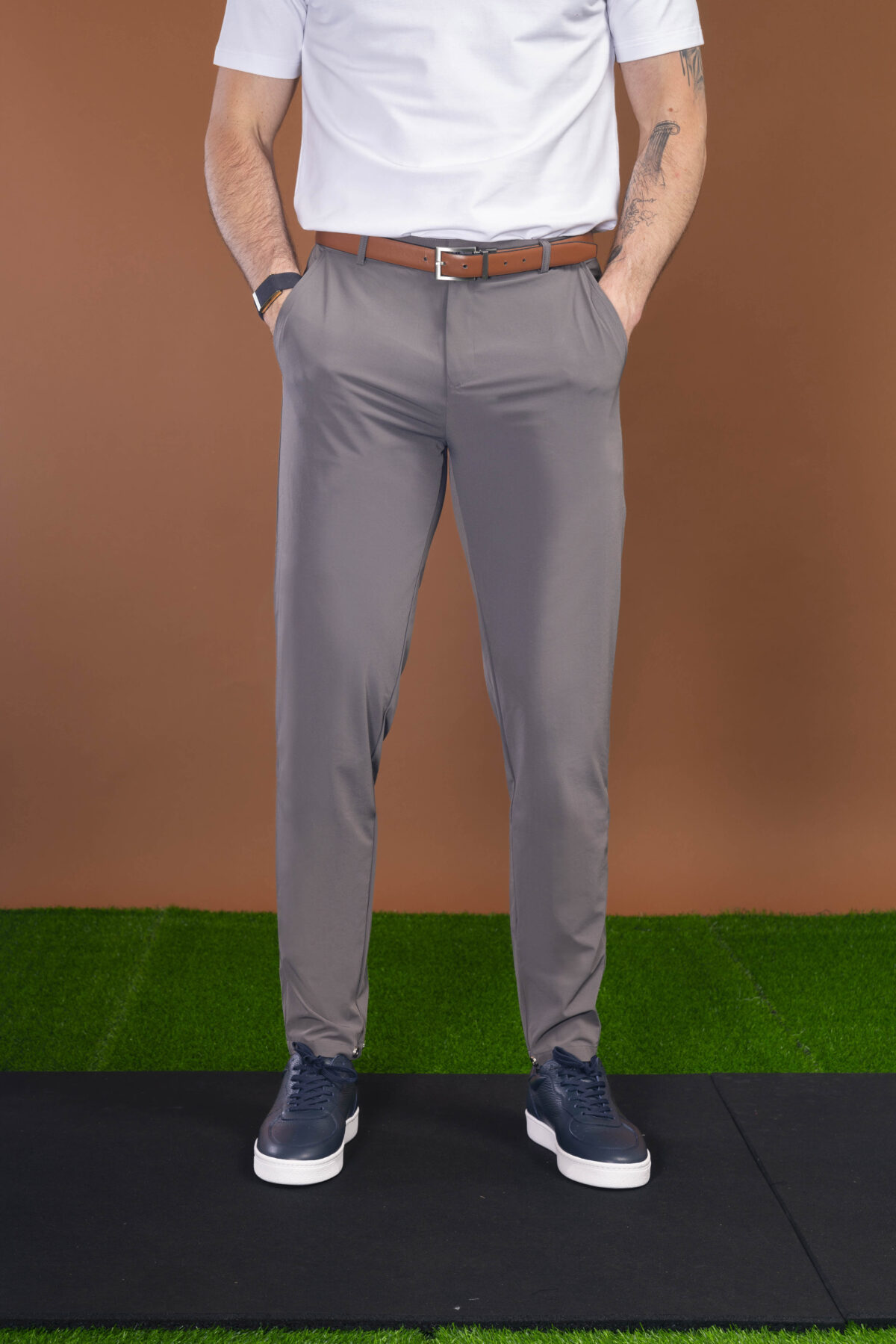 From the course to the commute and everywhere in between, these Tempo Golf Trouser (Light Grey) keeps your look fresh. The perfect trouser from the office to the golf course. Lightweight for the warmer months, with a mix of elastane to give you that full range of motion in your swing or extra comfort at the work desk. Keeping the look on trend, check out the magnetic clasp at the ankle that allows you to make the leg narrower if you wish.