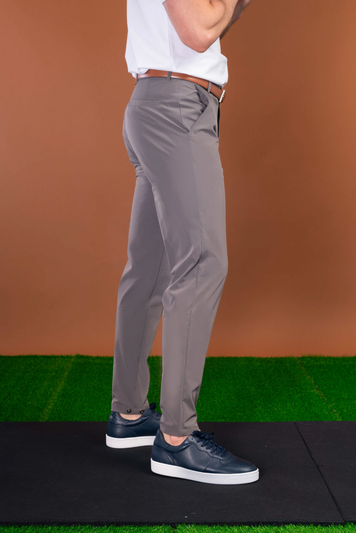 From the course to the commute and everywhere in between, these Tempo Golf Trouser (Light Grey) keeps your look fresh. The perfect trouser from the office to the golf course. Lightweight for the warmer months, with a mix of elastane to give you that full range of motion in your swing or extra comfort at the work desk. Keeping the look on trend, check out the magnetic clasp at the ankle that allows you to make the leg narrower if you wish.