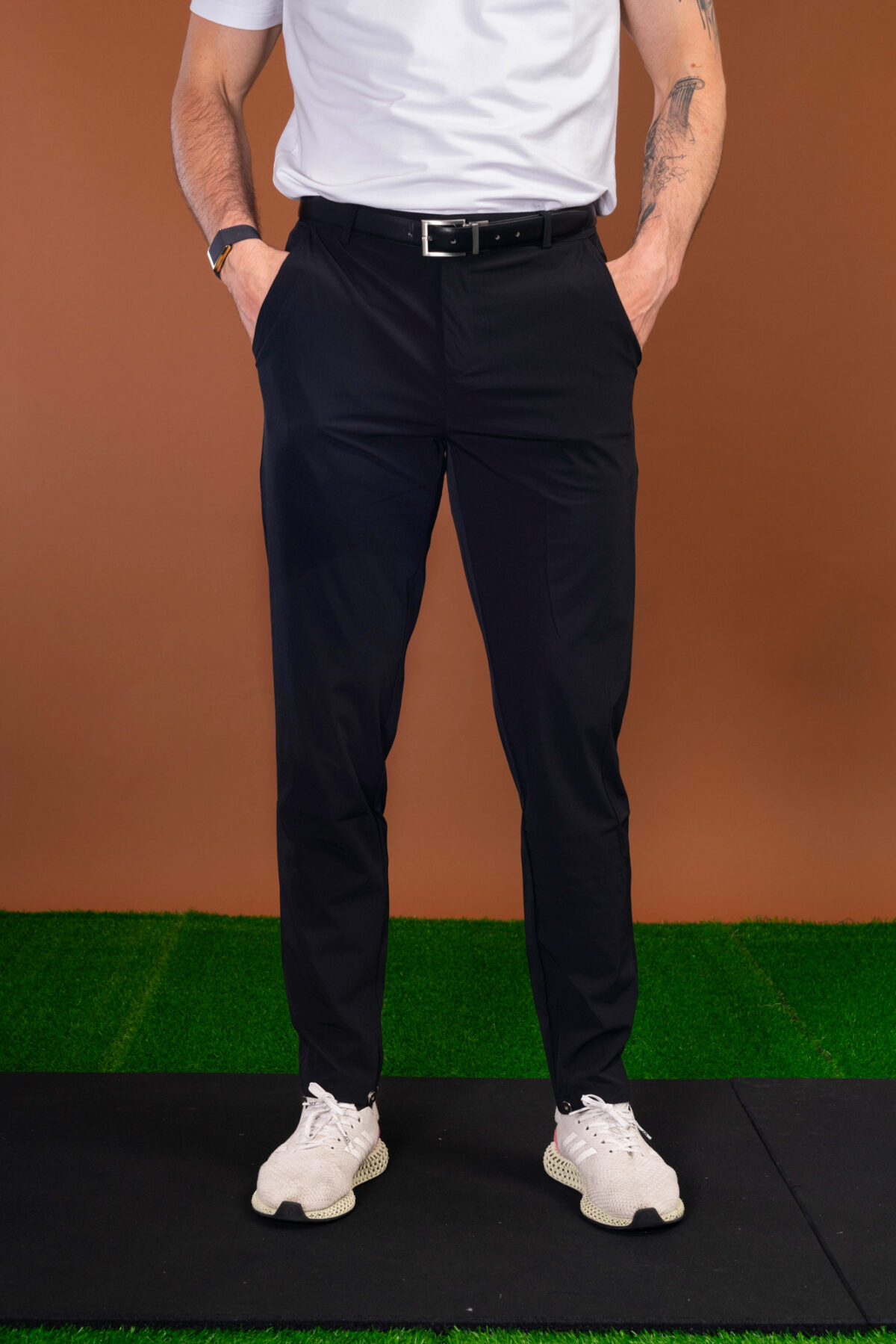 From the course to the commute and everywhere in between, these Tempo Golf Trouser (Black) keeps your look fresh. The perfect trouser from the office to the golf course. Lightweight for the warmer months, with a mix of elastane to give you that full range of motion in your swing or extra comfort at the work desk. Keeping the look on trend, check out the magnetic clasp at the ankle that allows you to make the leg narrower if you wish.