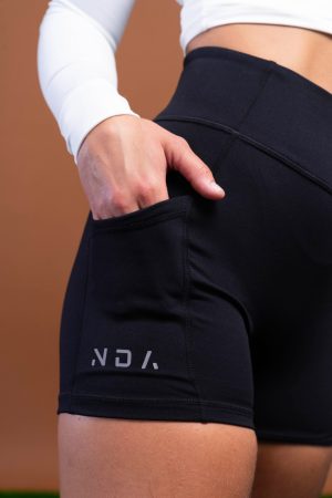 Designed with the same mix of materials as our Elite 1.0 Legging Collection, This new shorts gives you a high waistband for coverage and support with added length to the inside seam to stop your shorts riding up, with a phone holding pocket and reflective side logo Available in 5 Sizes. Made for performance.