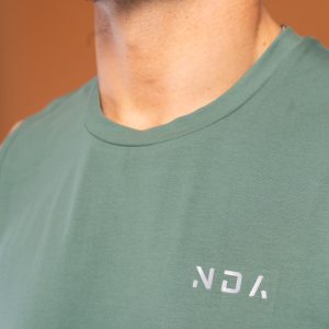 The Benchmark Tank Top (Olive) is designed to keep you cool and comfortable in any situation. The cotton blend material is soft and breathable, allowing air to circulate freely and keeping you cool. The stretch in the material ensures you can move without feeling restricted. The sleeveless design and high neckline give you a stylish look, while the lightweight material won’t weigh you down.