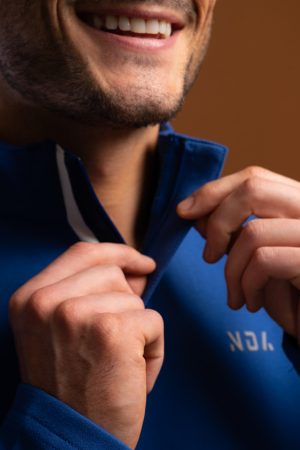 For those looking for a stylish and performance-driven 1/4 zip, the Tempo Golf 1/4 Zip (Blue) is the perfect choice. With its premium material, flatline design, and slimming fit, you can look and feel your best while playing golf. Whether you’re a beginner or a professional, the Golf 1/4 Zip is the perfect choice for any golfer.