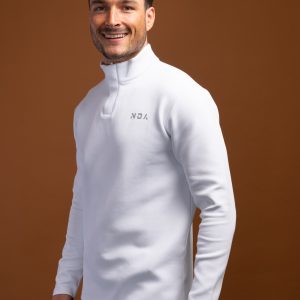 For those looking for a stylish and performance-driven 1/4 zip, the Tempo Golf 1/4 Zip (White) is the perfect choice. With its premium material, flatline design, and slimming fit, you can look and feel your best while playing golf. Whether you’re a beginner or a professional, the Golf 1/4 Zip is the perfect choice for any golfer.