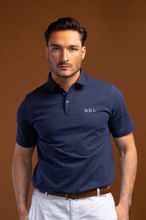 Tailored to move! This Tempo Golf Polo (Navy) is engineered for the movement and performance requirements of golf, it’s crafted in a cotton and spandex mix for a light wear with a soft feel. With a classic design, updated here with a modern, sportive 3-button neckline and textured trims. Pair with casual trousers and trainers for a relaxed weekend look whilst perfecting your swing.