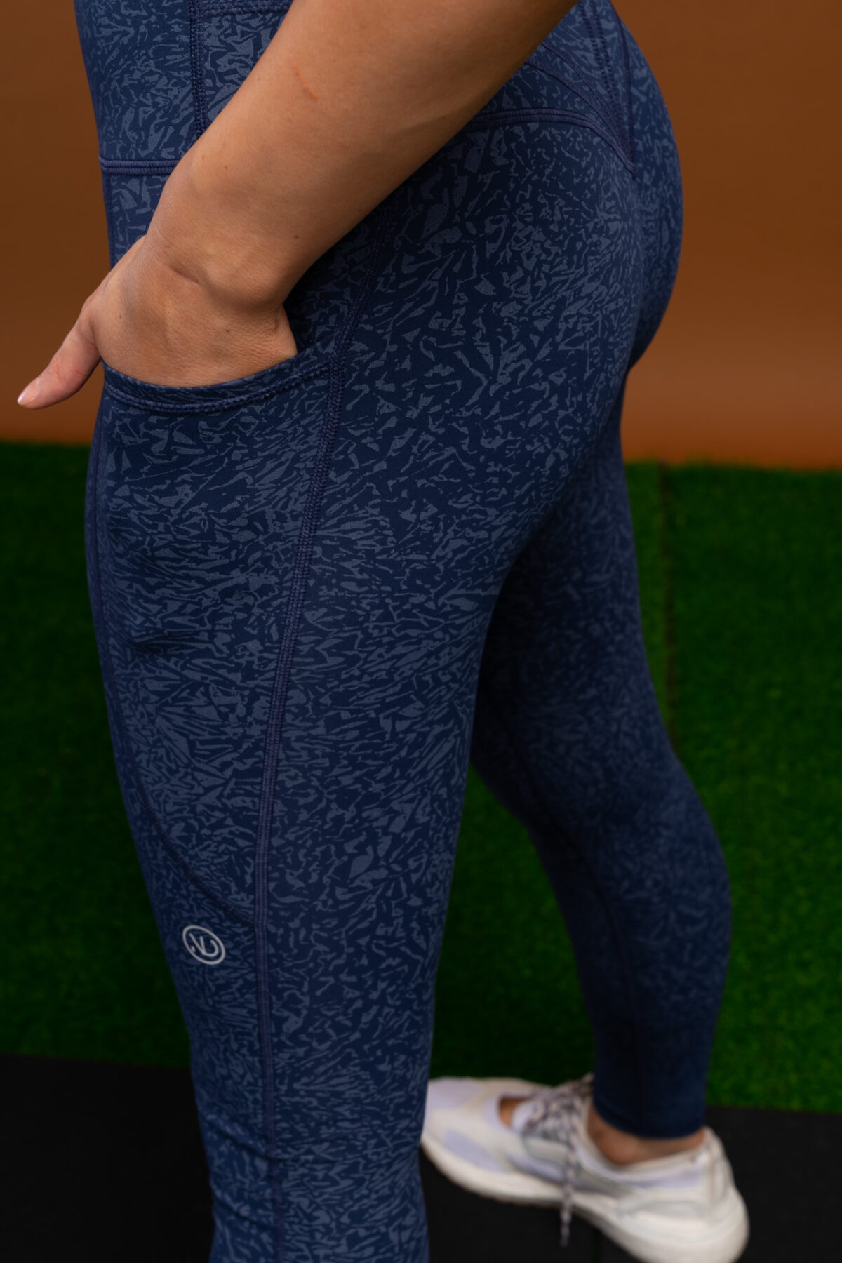 Our signature compression material has been given a facelift for ourLimitless Compression Legging (Navy) . While maintaining all of our Compression 3.0 features we have made this pair a difference maker. The back detail has been altered slightly for that extra shape enhancement and added the mockled pattern for that stand out look in your activewear wardrobe.