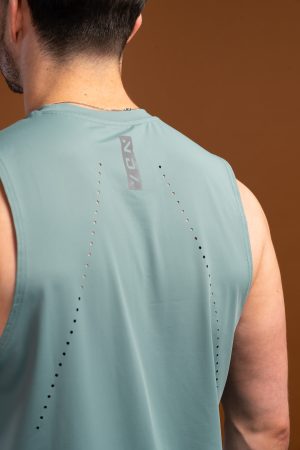 The Tempo Tank Top (Olive) is a must-have for any active man who wants to stay cool and comfortable during his workouts. The lightweight compression material is designed to keep you cool and dry, while the vented sides provide extra breathability. The no-sleeve design allows you to move freely without feeling restricted. Get ready to take your workouts to the next level.