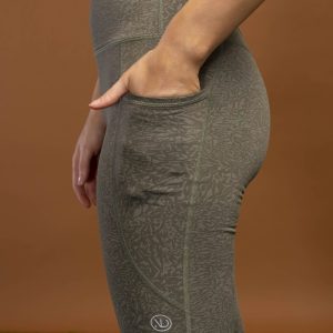 Our signature compression material has been given a facelift for ourLimitless Compression Legging (Olive) . While maintaining all of our Compression 3.0 features we have made this pair a difference maker. The back detail has been altered slightly for that extra shape enhancement and added the mockled pattern for that stand out look in your activewear wardrobe.