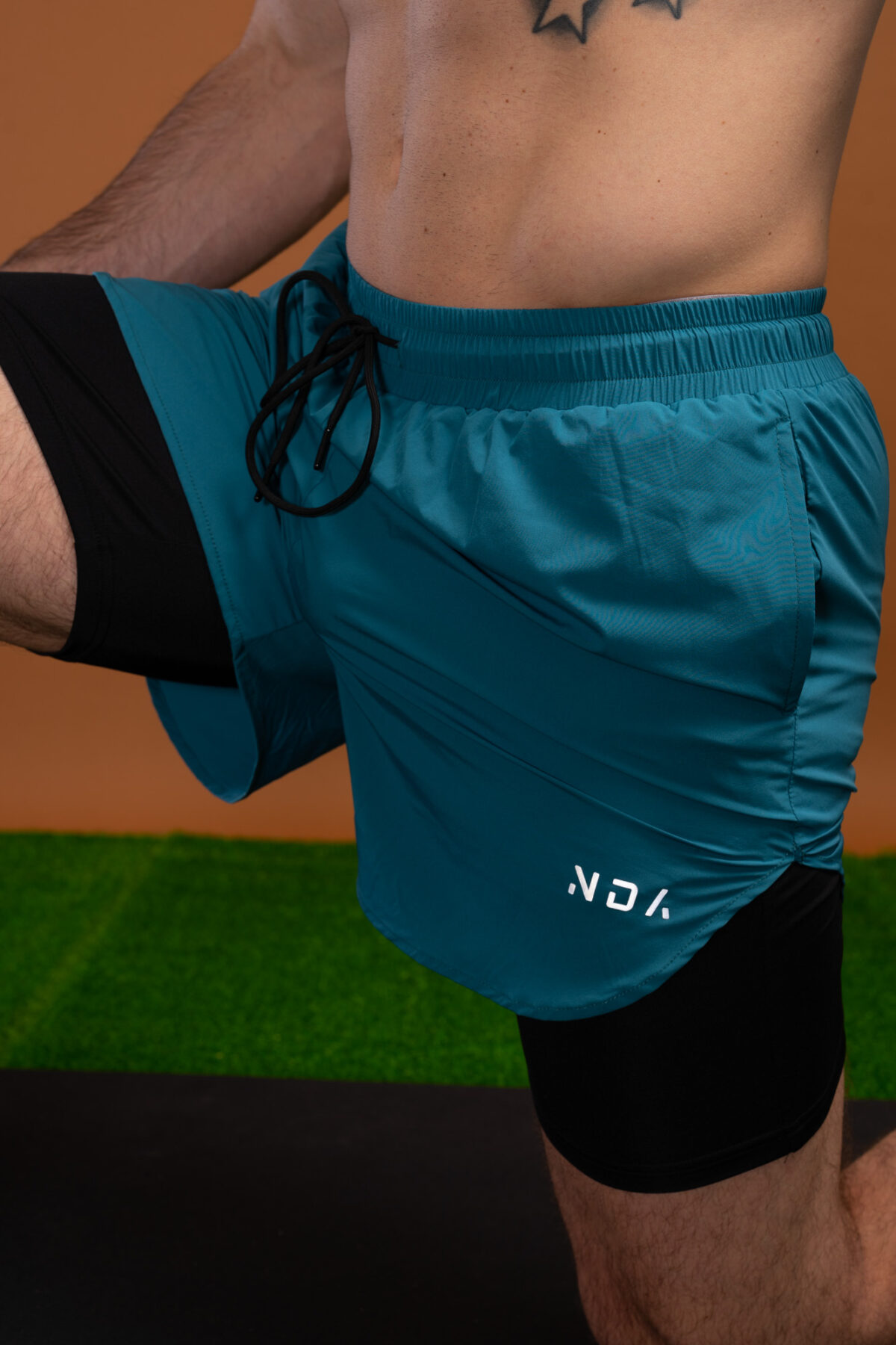 Introducing the Pacesetter Shorts (Teal), designed for the runner in mind. These shorts provide superior performance and comfort with a two in one style. The lightweight material overlay provides a comfortable fit while the compression under layer provides the support and stability you need for running. The side split allows for maximum movement and flexibility while running, while the reflective logos make sure you’re visible in low light conditions. The two front pockets provide the perfect place to store your essentials while you’re on the go. Get the Pacesetter Shorts and take your running to the next level.