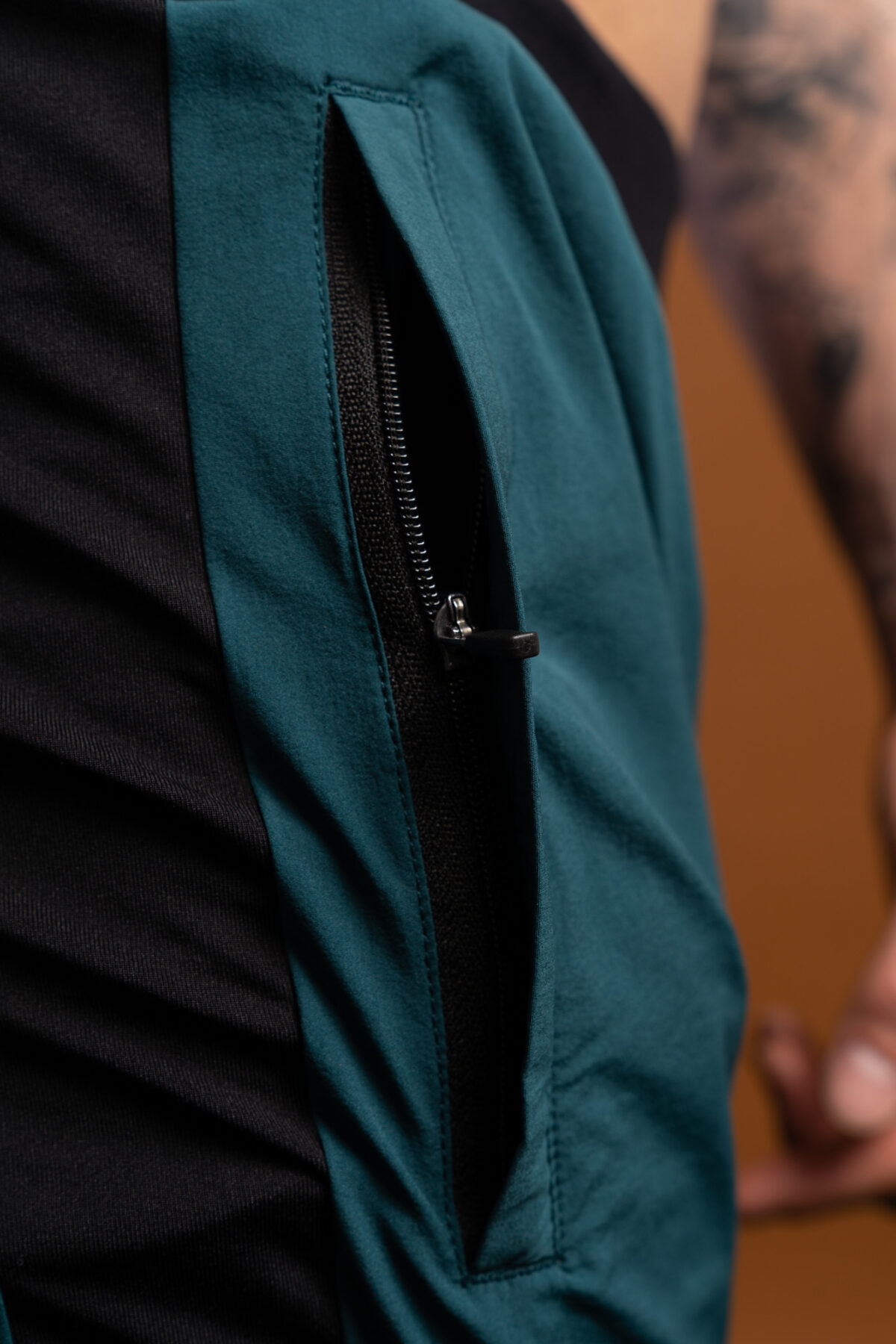 Introducing the revolutionary Benchmark Performance Shorts (Dark Teal)! Our new innovation is disguised as a 2 in 1, but is in fact an outer layer attached to the under layer to optimise movement and provide the best performance possible. These shorts are made from a lightweight and breathable fabric that is designed to provide a comfortable fit and move with you. The fabric is also water-resistant, so you can stay dry and comfortable no matter the activity. The four-way stretch fabric ensures that you have the full range of movement needed to perform your best.