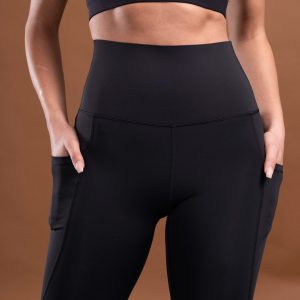 Introducing the Pacesetter Legging (Black), the perfect choice for running and high tempo training. Our leggings are designed with high intensity in mind, featuring our new Hex-Elastic Technology waistband that provides superior support like no other. The fabric is also squat proof, allowing you to move with confidence. The Legging is designed to keep up with your active lifestyle. The fabric is lightweight and breathable, allowing you to stay cool and comfortable during your workout.