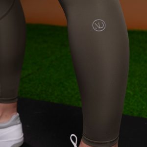 Introducing the Pacesetter Legging (Olive), the perfect choice for running and high tempo training. Our leggings are designed with high intensity in mind, featuring our new Hex-Elastic Technology waistband that provides superior support like no other. The fabric is also squat proof, allowing you to move with confidence. The Legging is designed to keep up with your active lifestyle. The fabric is lightweight and breathable, allowing you to stay cool and comfortable during your workout