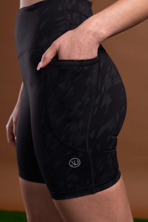 This Resilient 7 Inch Shorts (Black) is designed to provide maximum comfort and support during your workouts. With a new shape-enhancing back detail, you can be sure that your shorts will stay in place no matter how intense your workout is. They also feature a side accessory pocket, so you can store your keys or phone while you’re working out. The reflective logos make you visible in low light conditions, so you can stay safe while exercising outdoors. The unique pattern adds a stylish touch to the shorts, while the flatline drawstring elastic ensures a secure fit.