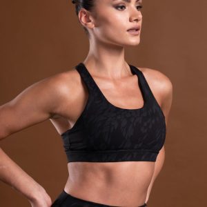 The perfect mix of two of our signature materials, our elite and compression 3.0 have combined to make this buttery soft Resilient Sports Bra (Black). This bra is designed to provide maximum support and comfort during your most intense workouts. The new print pattern and criss cross back detail make this sports bra a stylish and functional choice for any active lifestyle.