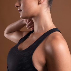 The perfect mix of two of our signature materials, our elite and compression 3.0 have combined to make this buttery soft Resilient Sports Bra (Black). This bra is designed to provide maximum support and comfort during your most intense workouts. The new print pattern and criss cross back detail make this sports bra a stylish and functional choice for any active lifestyle.