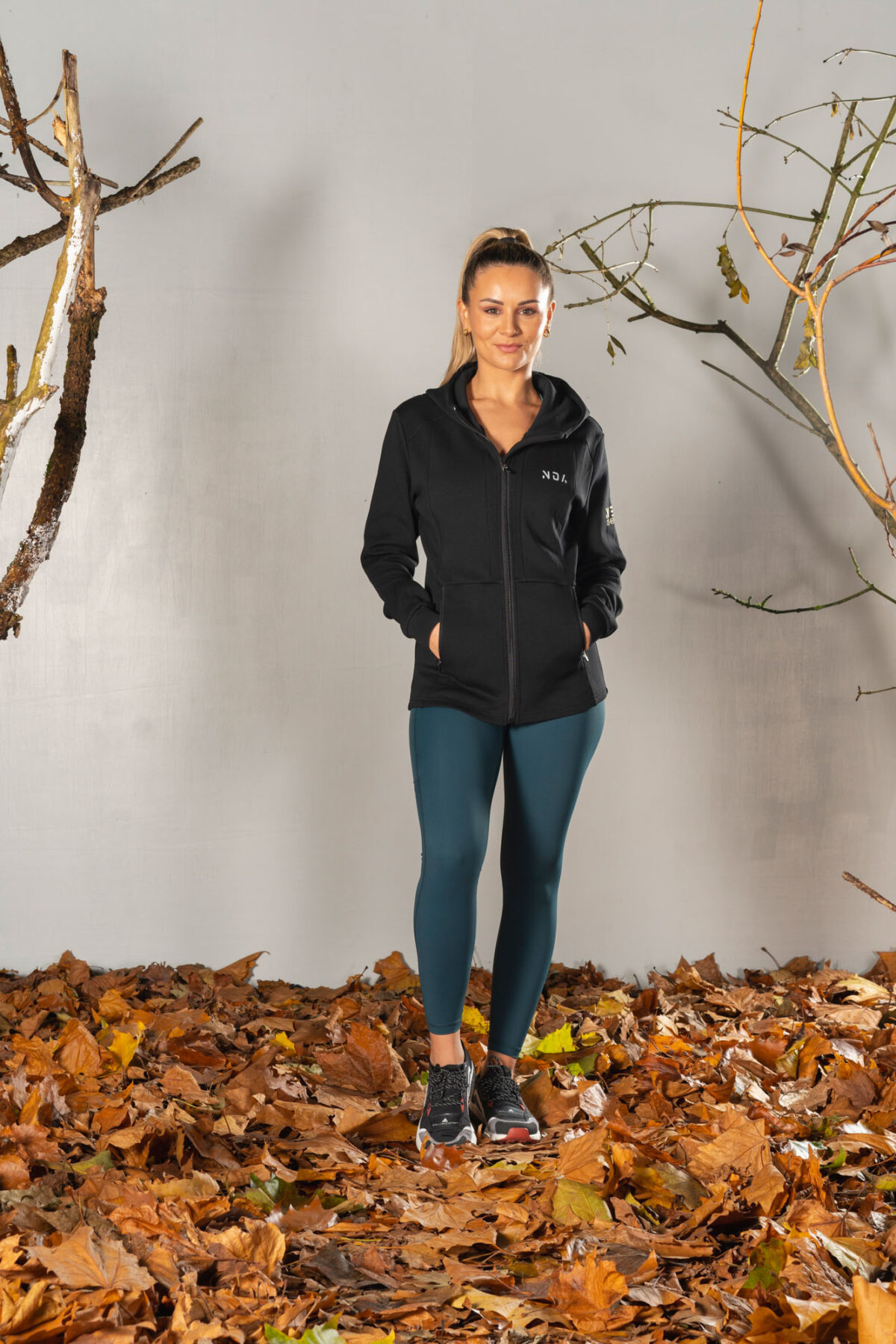 Deluxe Refined Hoodie (Black), the ultimate combination of style and functionality. This shape-enhancing full zip hoodie is the perfect layering piece for any occasion.