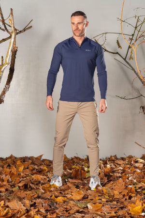 Elevate ¼ Zip (Navy), the ultimate performance top. Made with a perfect blend of polyester and spandex, this top offers unparalleled comfort and flexibility. Whether you're warming up or cooling down, the Elevate 1/4 Zip has you covered.