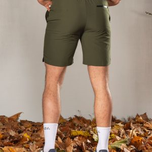 Elevate Men's Shorts (Olive), the perfect combination of style and functionality. Crafted with lightweight material, these shorts provide ultimate comfort and breathability for all your activities. Featuring two side pockets and an additional zip pocket, you can easily store your essentials while on the move.