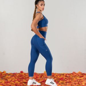 Elevate Sports Bra (Midnight Blue). Designed for comfort & support, This bra features a thick elastic band for a secure fit & removable padding for customizable support.