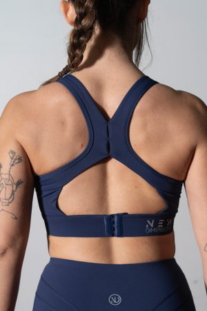 Elevate Sports Bra (Navy). Designed for comfort & support, This bra features a thick elastic band for a secure fit & removable padding for customizable support.
