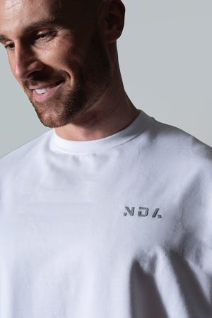 Elevate Oversize Tee (White). Crafted from premium cotton. Its oversize fit allows for freedom of movement. Push yourself to the limit in style.