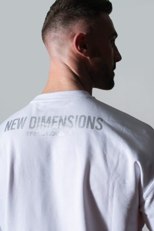 Elevate Oversize Tee (White). Crafted from premium cotton. Its oversize fit allows for freedom of movement. Push yourself to the limit in style.