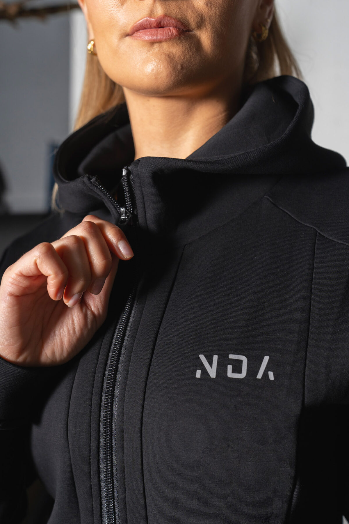 Deluxe Refined Hoodie (Black), the ultimate combination of style and functionality. This shape-enhancing full zip hoodie is the perfect layering piece for any occasion.