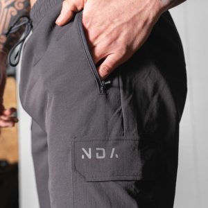 Introducing the Elevate Cargo Jogger (Dark Grey) - the perfect combination of style and functionality for the everyday explorer. Whether you're hitting the gym for a tough workout or venturing out into nature for a new adventure, these joggers are designed to keep up with your active lifestyle.