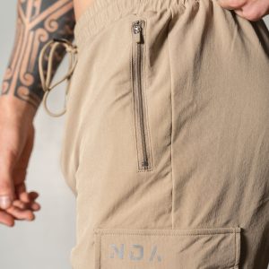 Introducing the Elevate Cargo Jogger (Beige) - the perfect combination of style and functionality for the everyday explorer. Whether you're hitting the gym for a tough workout or venturing out into nature for a new adventure, these joggers are designed to keep up with your active lifestyle.