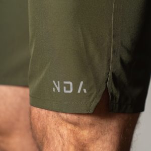 Elevate Men's Shorts (Olive), the perfect combination of style and functionality. Crafted with lightweight material, these shorts provide ultimate comfort and breathability for all your activities. Featuring two side pockets and an additional zip pocket, you can easily store your essentials while on the move.